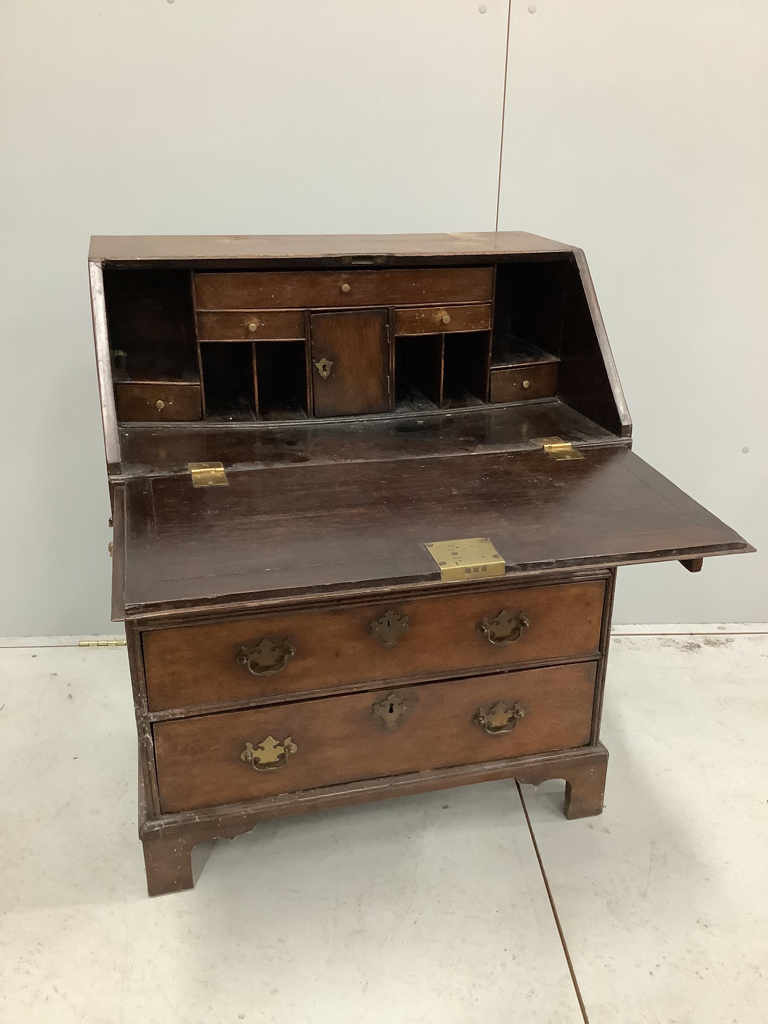 A small George III oak bureau, width 76cm, depth 48cm, height 95cm